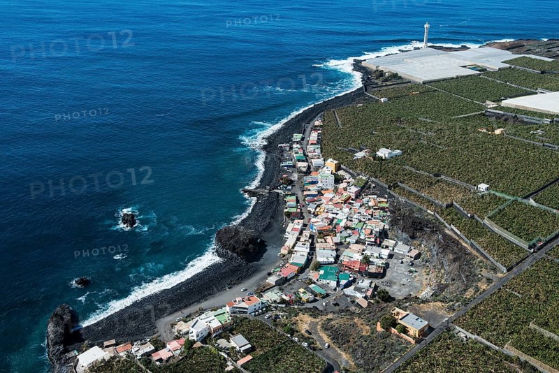 La Bombilla with black lava beach and lighthouse