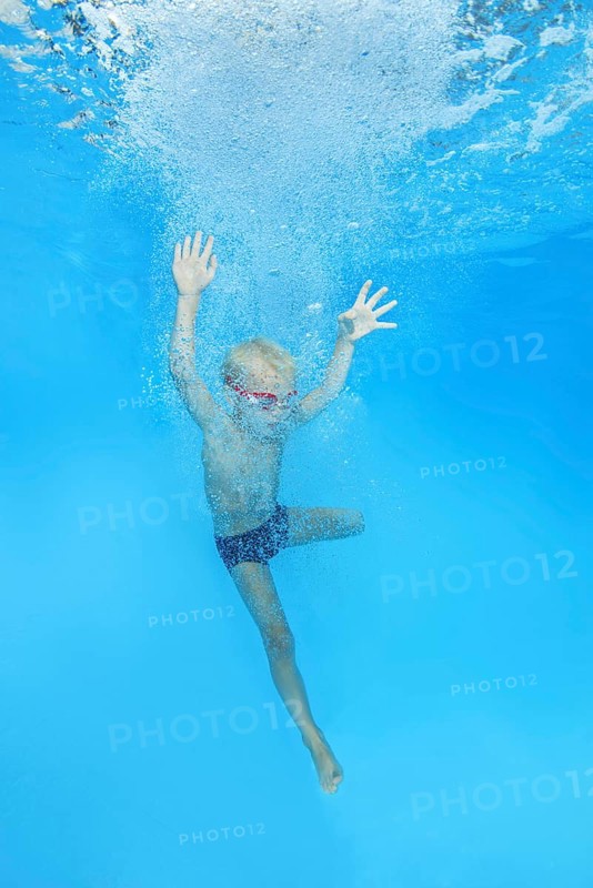 Little boy with swimming goggles