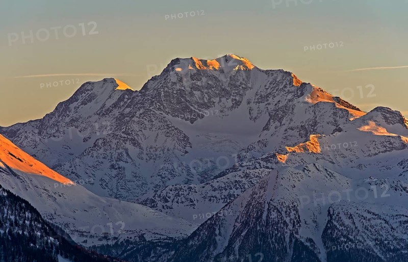 Evening sun on snowy peaks