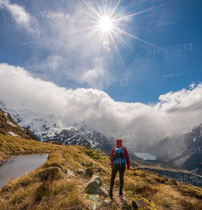 Hiker looking into Hooker Valley
