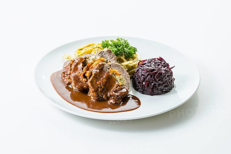 Wild meat roulade stuffed with gherkin