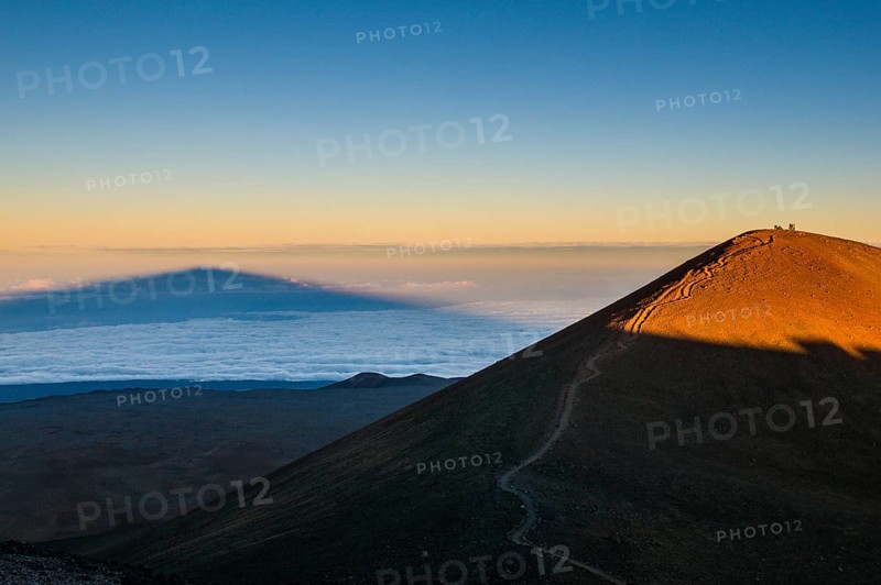 Mauna Kea in evening light casts a shadow