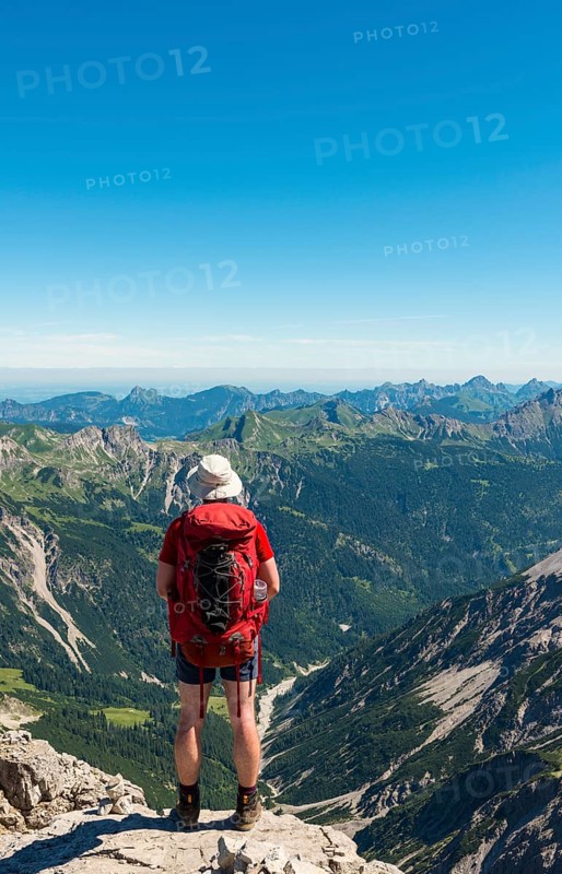 Hiker views of mountains and Alps