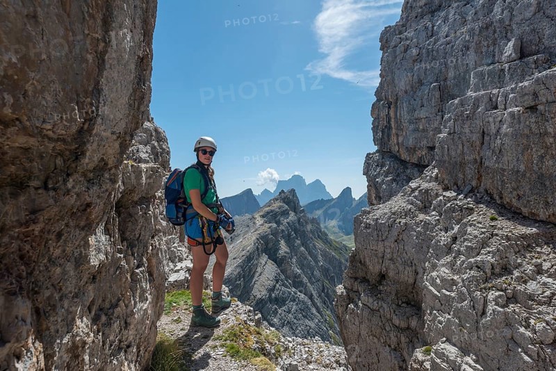 Woman on via ferrata to Averau