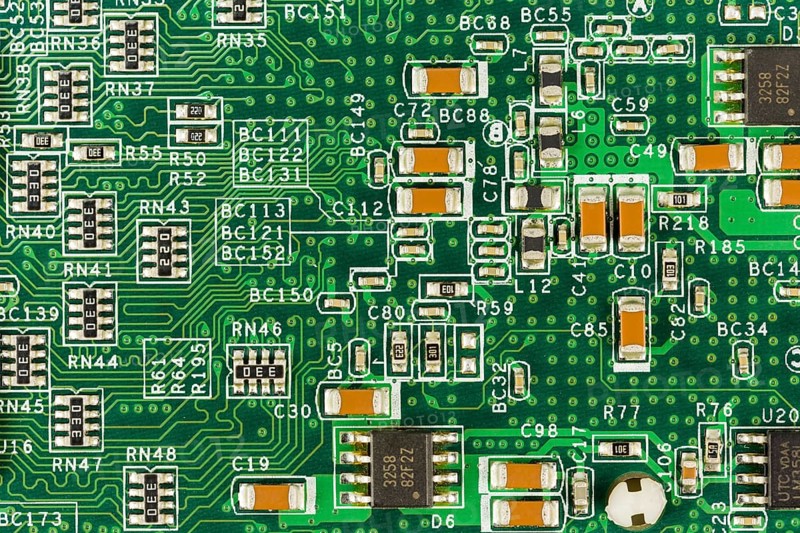 Green circuit board with conductive tracks and elements