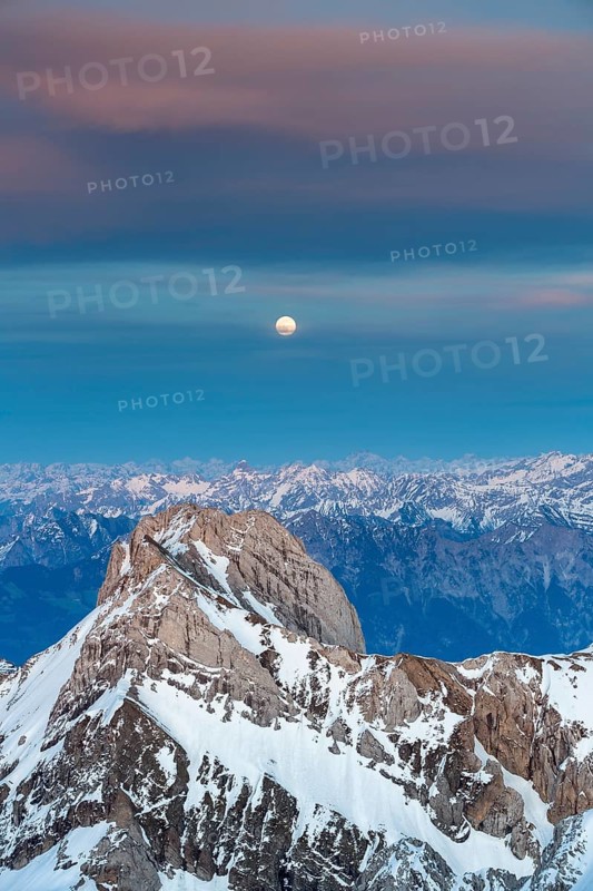 Santis Mountain overlooking Alpstein massif at full moon