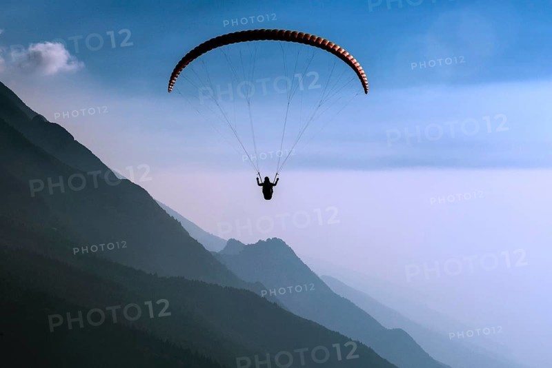 Paraglider over Lake Garda in Malcesine