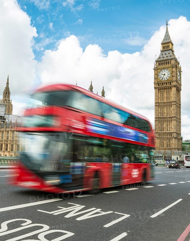 Red double-decker bus on the Westminster Bridge