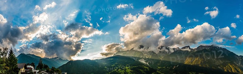 Alpine panoramay with cloud sky