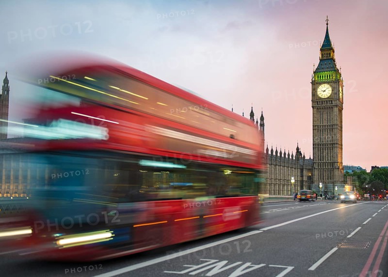Red double-decker bus on the Westminster Bridge