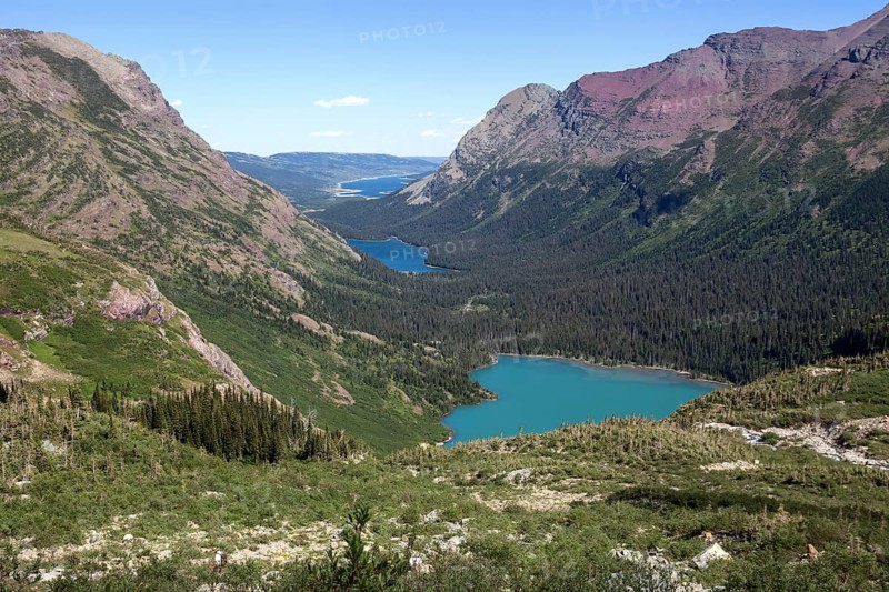 Mountain landscape at Grinnell Glacier Trail with View of Grinnell Lake