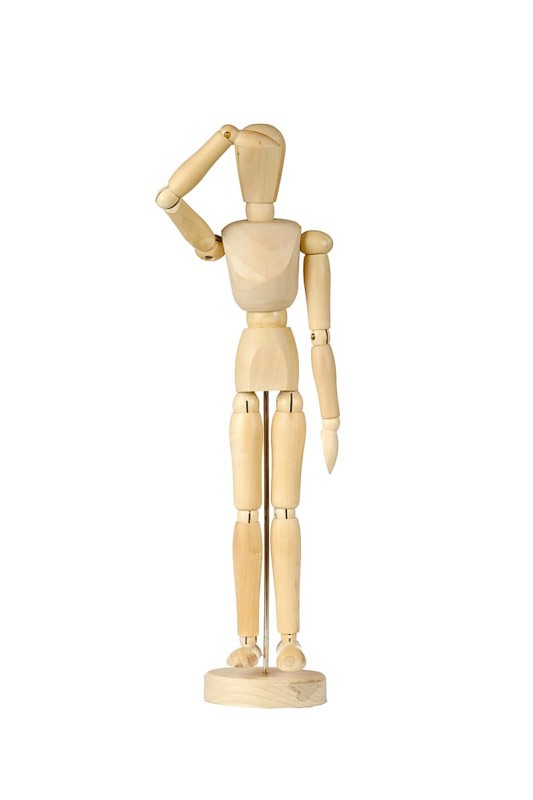 Wooden stickman looking into the distance