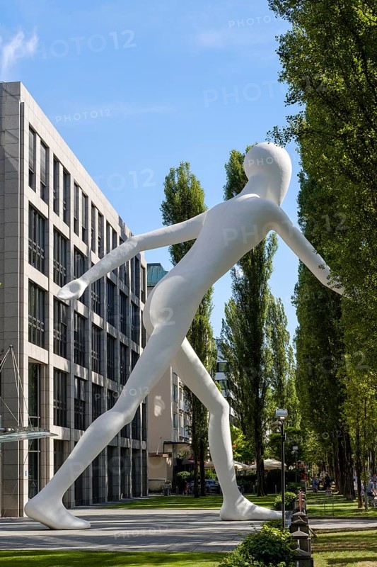 Walking Man sculpture by Jonathan Borofsky in front of insurance company Munich Re