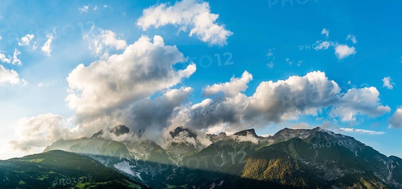 Alpine panorama with clouds