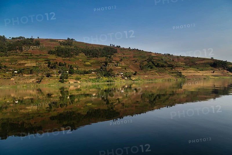 Hills reflecting on the water