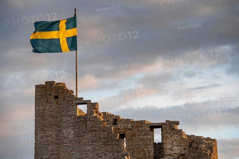 Swedish flag on medieval city wall