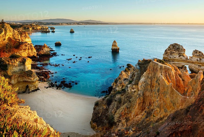 Beach and rocky coast Praia do Camilo