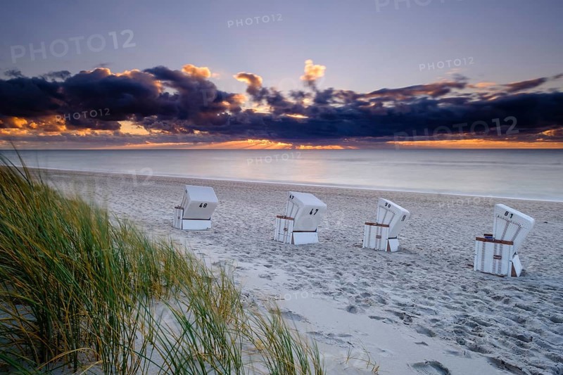 Beach chairs at the west beach of Hornum in the evening light
