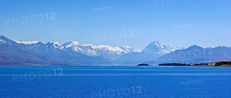 Deep blue glacial Lake Pukaki with mountains