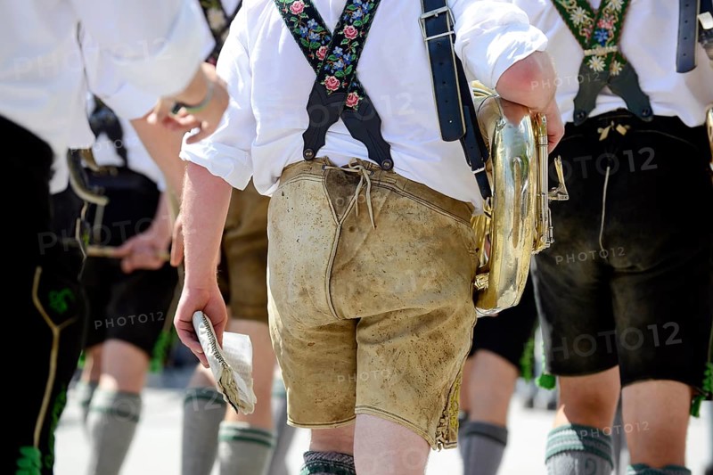 Musicians in leather trousers and Tuba