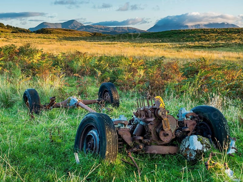 Car wreck on sheep pasture near Portree