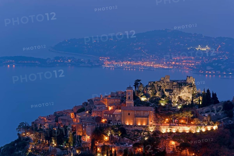 Flood-lit village with church