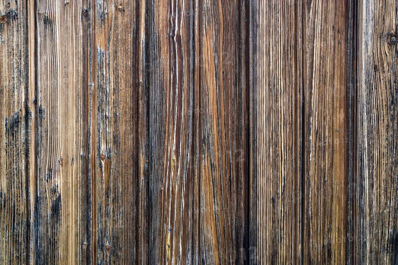 Old weathered wooden boards on wooden wall