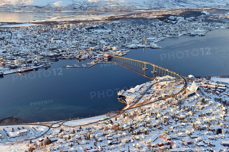 Snowy town with bridge