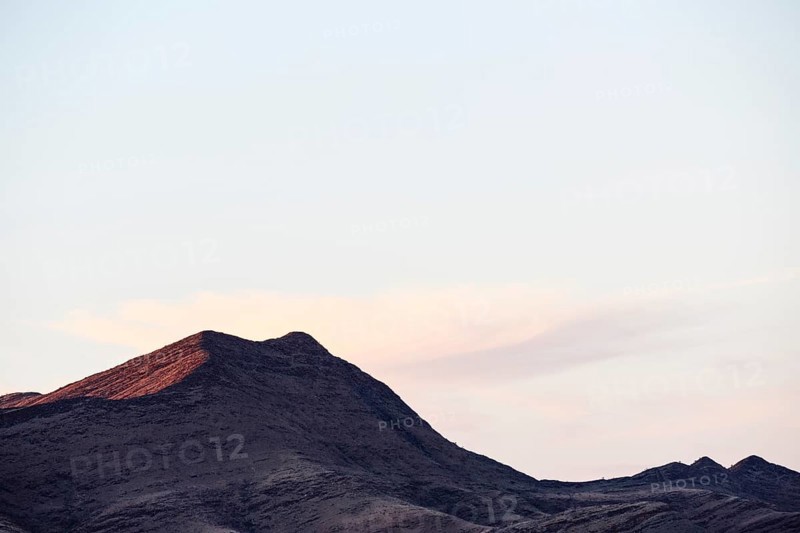 Hilly landscape in evening light