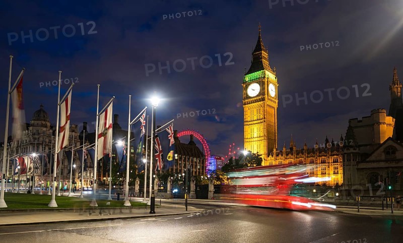 Red double-decker bus in front of Big Ben