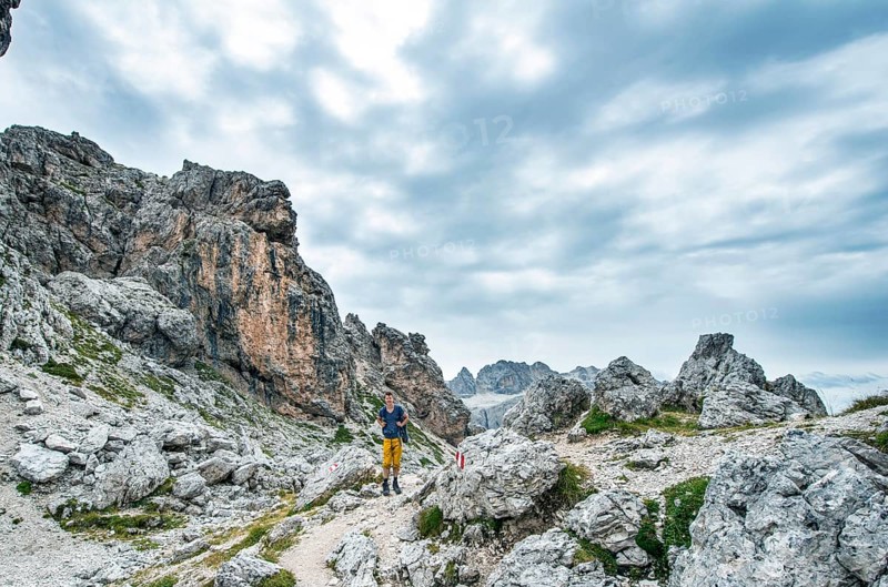 Hikers on the circular trail around the Sella Group