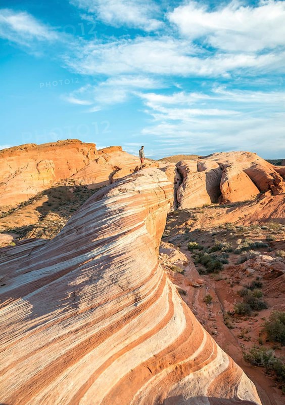 Young man on Fire Wave Rock