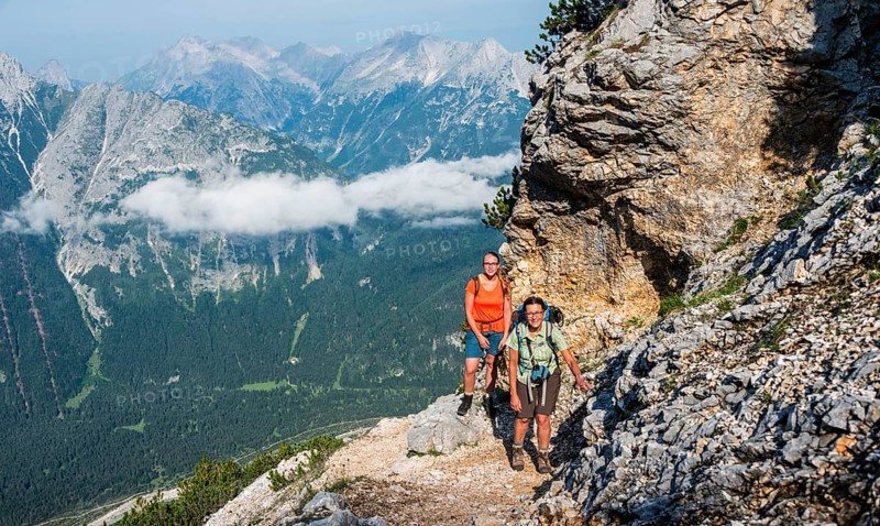 Two female hikers on trail