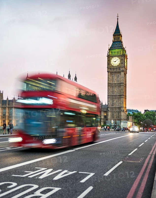 Red double-decker bus on the Westminster Bridge