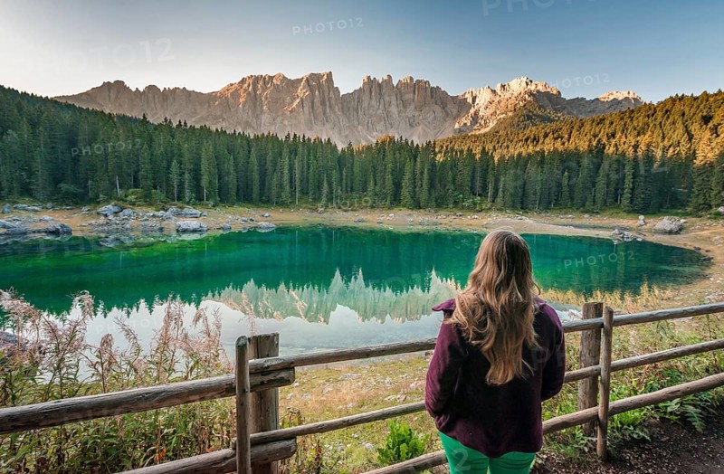 Woman overlooks Lake Carezza