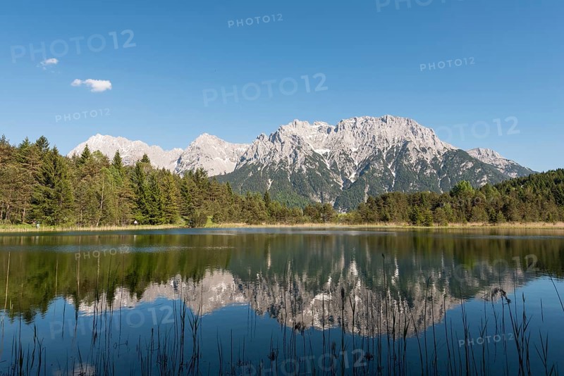 Western Karwendelspitze is reflected in the Luttensee