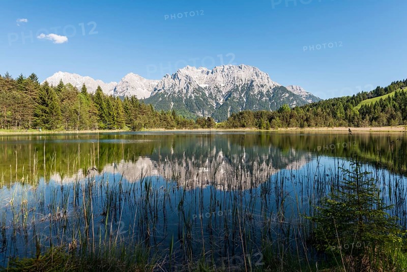 Western Karwendelspitze is reflected in the Luttensee