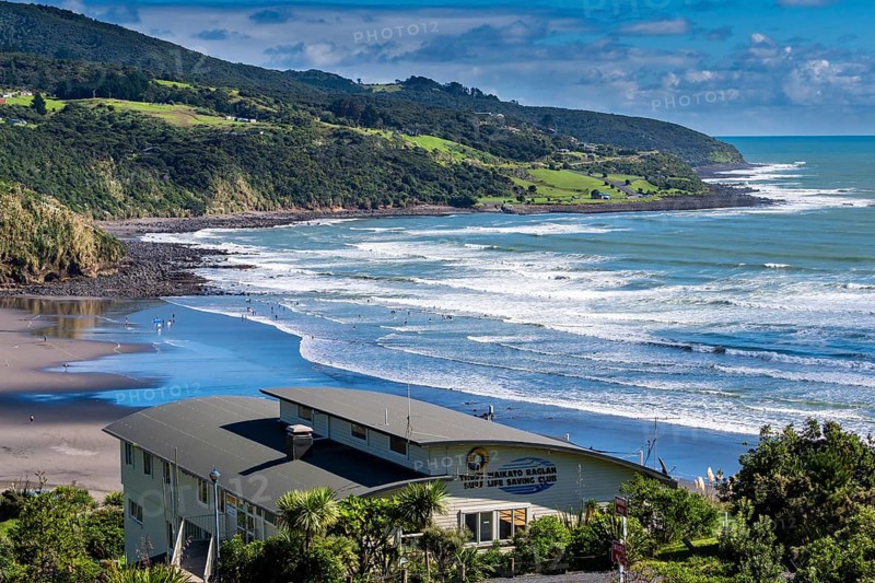 Surfers at Ngarunui Beach