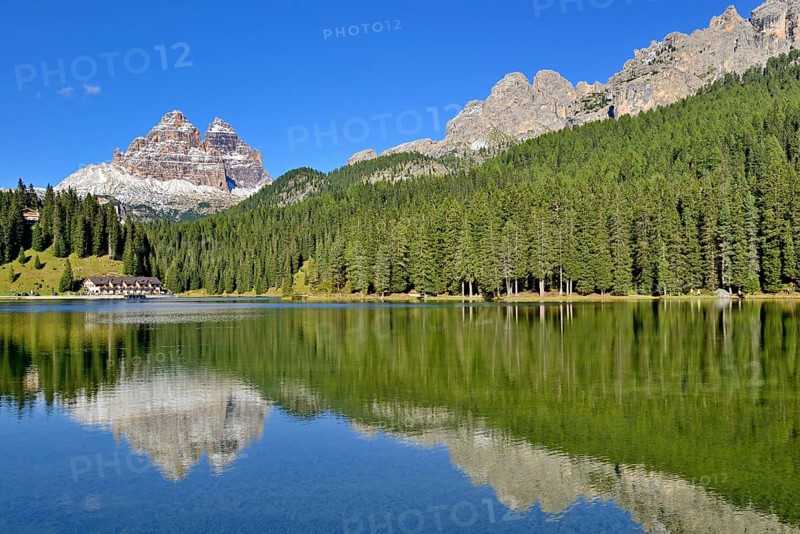 Three Peaks of Lavaredo southern walls water reflection in Lake Misurina