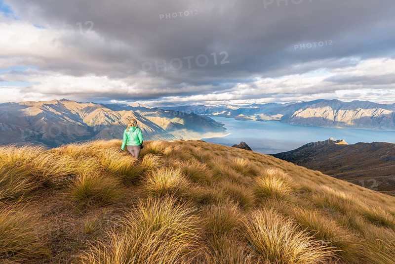 Hiking woman looking at lake