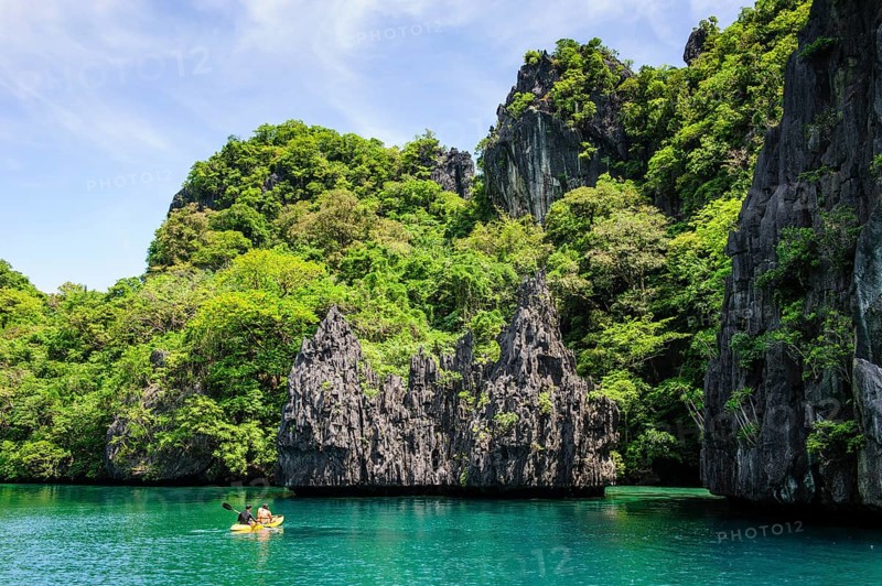 Kayaking in the crystal clear water in the Bacuit archipelago