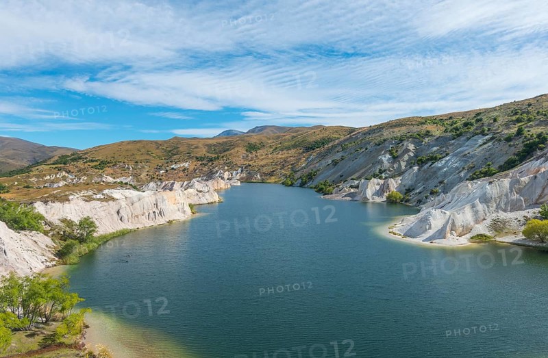 Lake surrounded by limestone cliffs