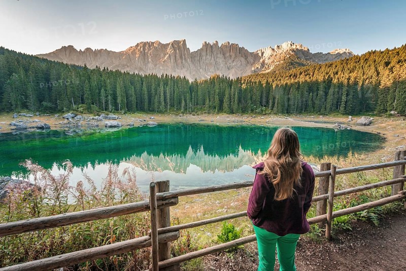 Woman overlooks Lake Carezza
