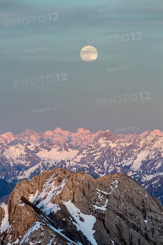 Santis Mountain overlooking Alpstein massif at full moon