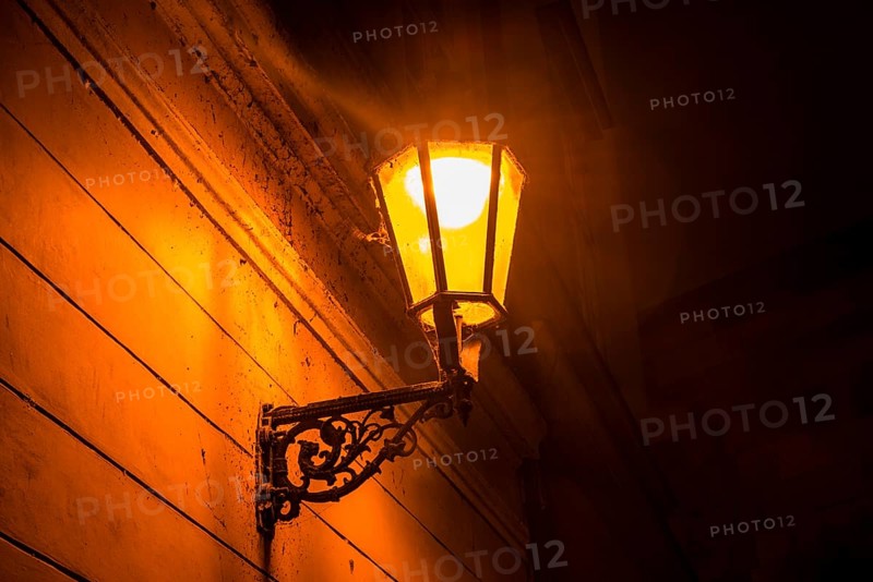 Old street lamp lit