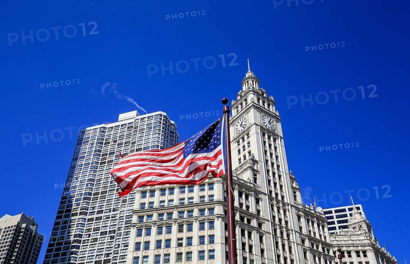 American flag in front of Wrigley Building