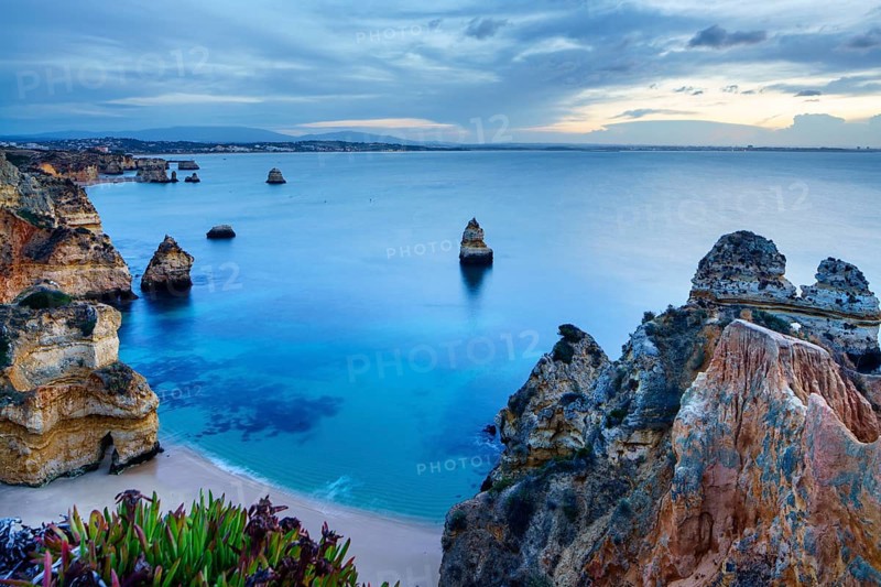 Beach and rocky coast Praia do Camilo