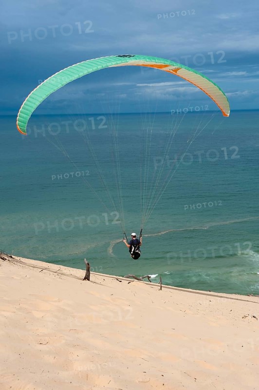 Paraglider on coast