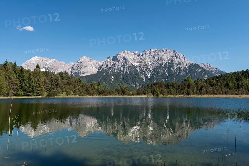Western Karwendelspitze is reflected in the Luttensee