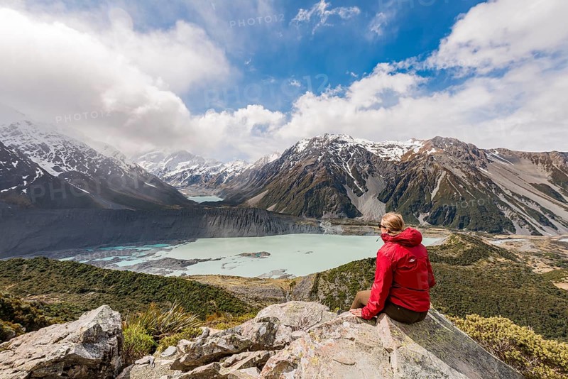 Hiker sitting on rocks
